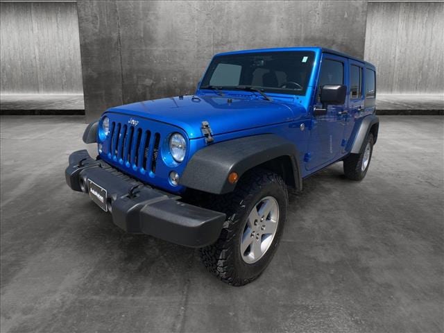 Used 2015 Jeep Wrangler Unlimited Sport with VIN 1C4BJWDG5FL743972 for sale in Littleton, CO