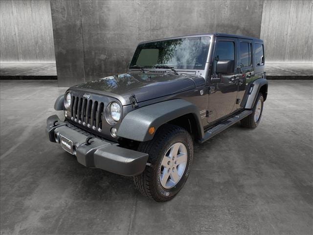 Used 2016 Jeep Wrangler Unlimited Sport S with VIN 1C4BJWDG1GL323918 for sale in Littleton, CO