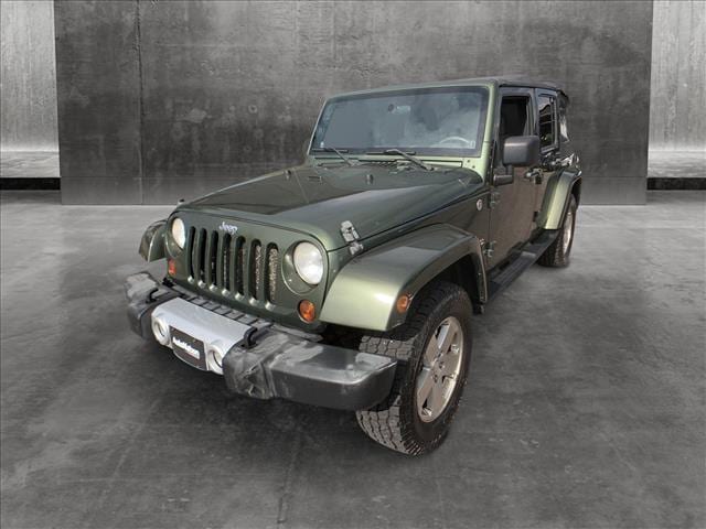 Used 2008 Jeep Wrangler Unlimited Sahara with VIN 1J4GA59138L648330 for sale in Littleton, CO