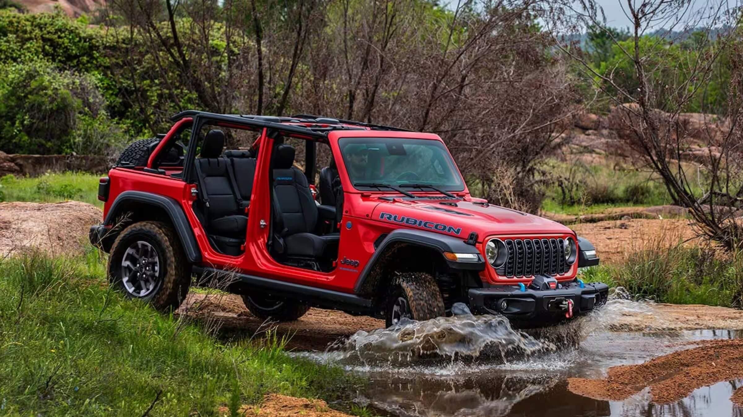 Exterier shot of Jeep Wrangler with removed roof and door