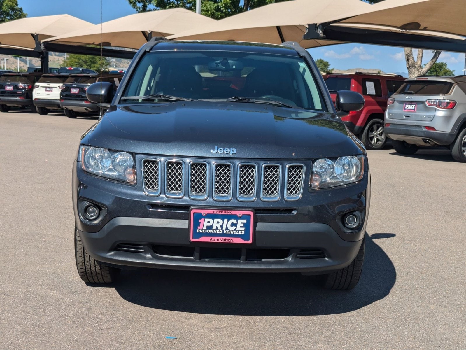 Used 2014 Jeep Compass Latitude with VIN 1C4NJDEBXED718854 for sale in Golden, CO