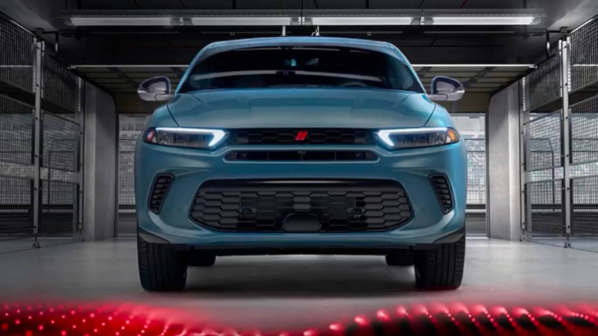 Dodge Hornet facing forwards in frame with post-photo electrical looking image styling along the bottom.