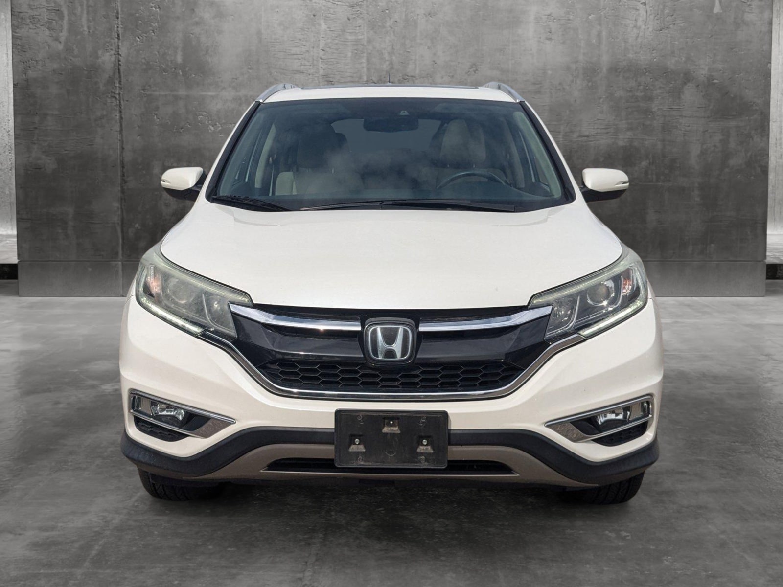 Used 2015 Honda CR-V Touring with VIN 5J6RM3H9XFL021925 for sale in Westminster, CO