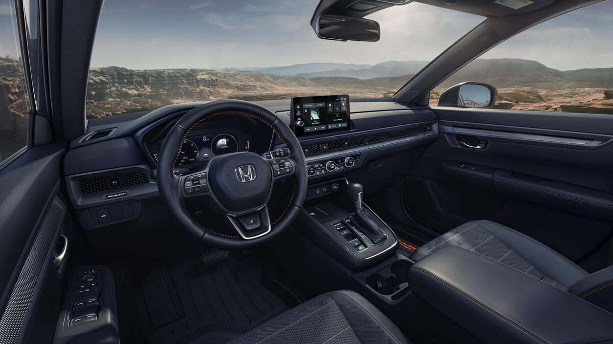  The interior of a CR-V with a desert landscape outside the windows.