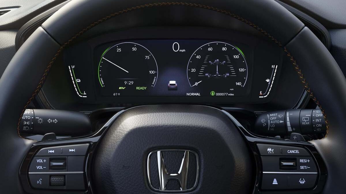  The digital gauges behind the steering wheel of a Honda CR-V