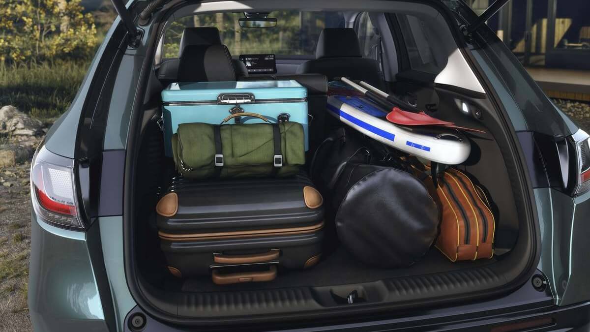  The back of an HR-V opened to reveal luggage and other bags packed away.