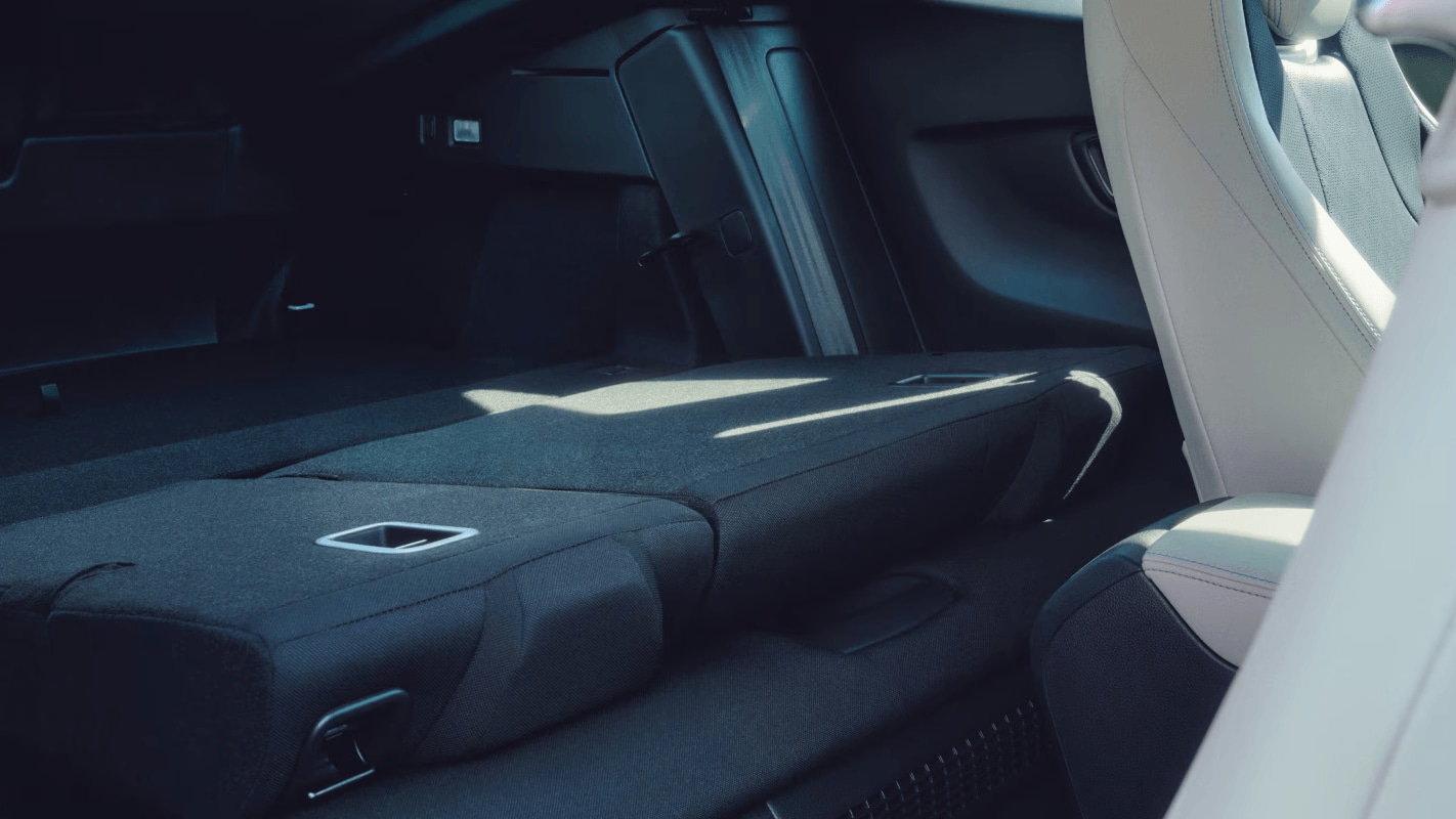 Interior shot of the Honda Prelude showing the rear seats folded down to expand cargo storage