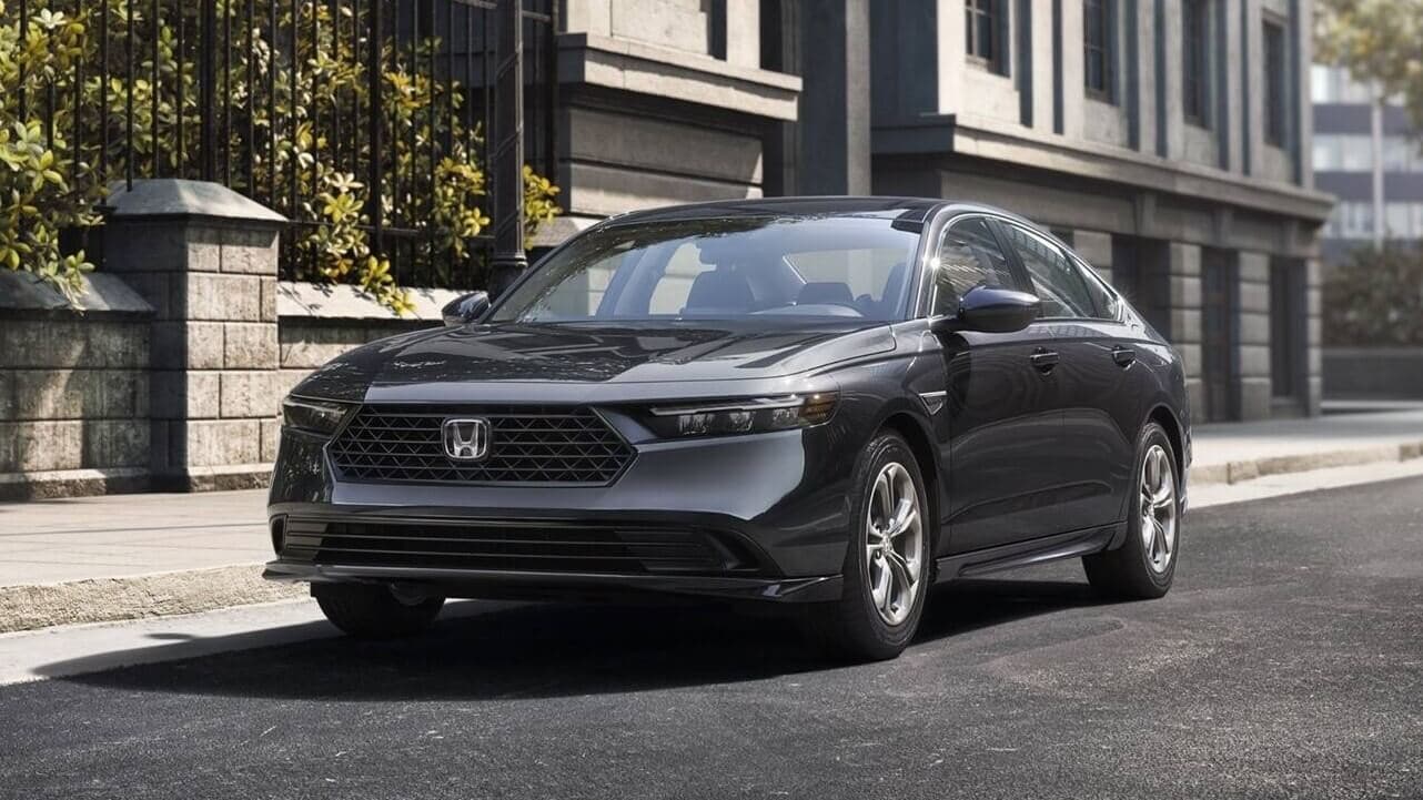 A 2025 Honda Accord driving down a city street