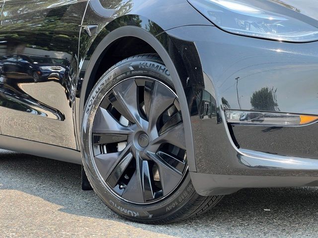 Used 2025 Tesla Model Y Long Range with VIN 7SAYGAEE8SF299043 for sale in Renton, WA