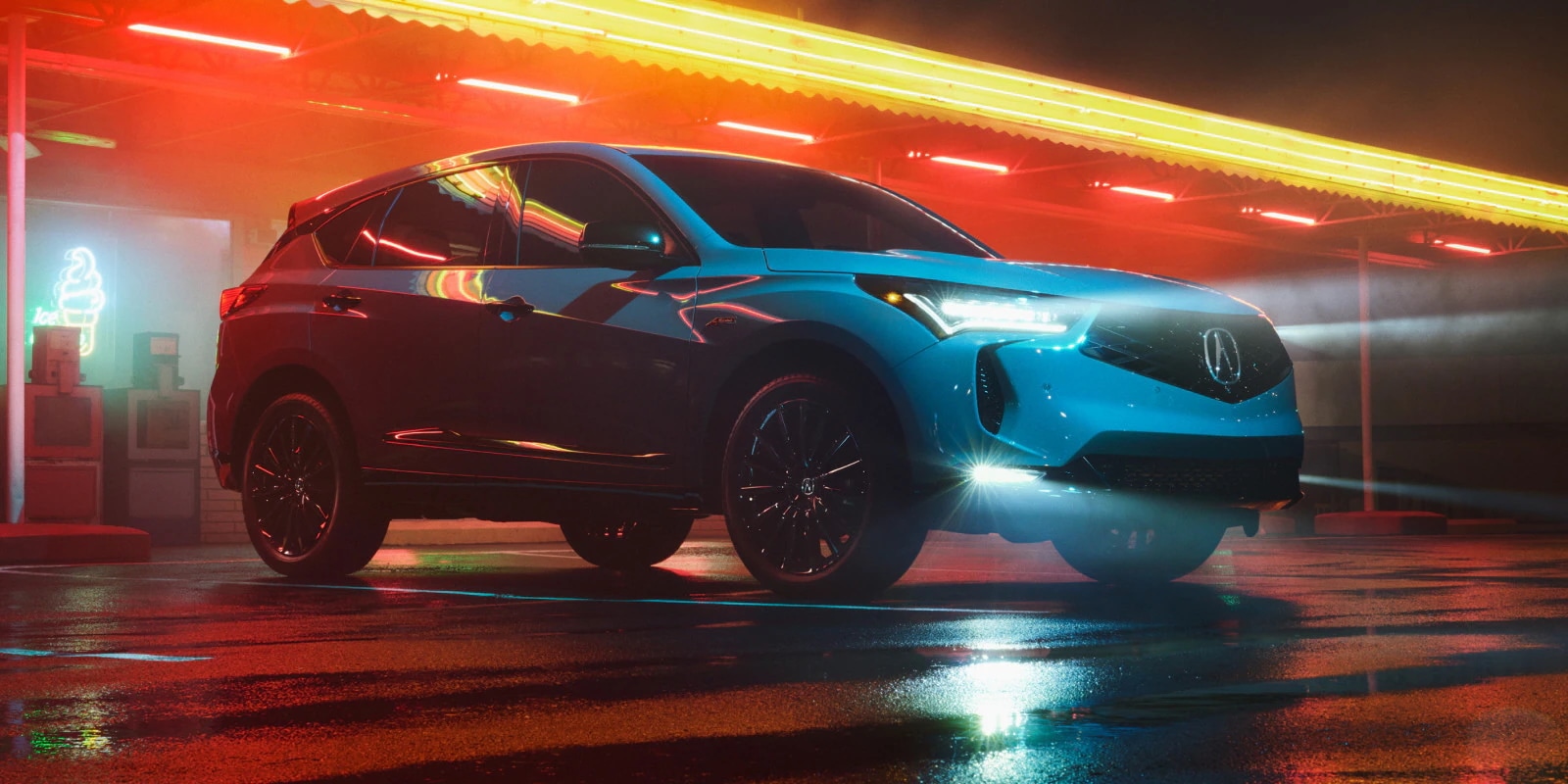 The 2026 Acura RDX parked at night