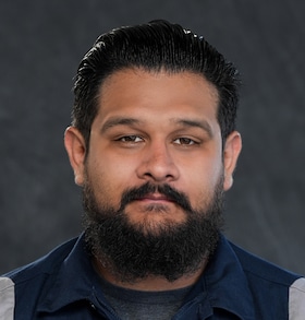 Staff member Eric Rodriguez from 13fc1c93df38