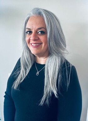 Staff member THERESA MARTINI from 6a5cc3e57091