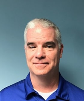 Staff member Cary Holmes from 99c81921707c