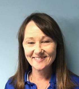 Staff member Nancy Bailey from 99c81921707c