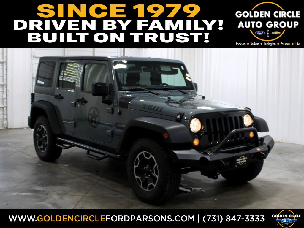 Used 2015 Jeep Wrangler Unlimited Sport with VIN 1C4BJWDG3FL597491 for sale in Parsons, TN