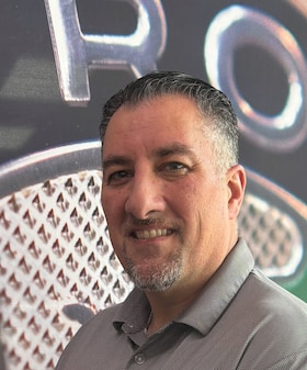Staff member John Jina from 3174a305d11d