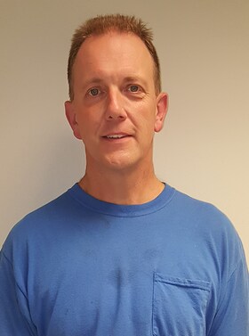 Staff member John Delbridge from 181beb965d45
