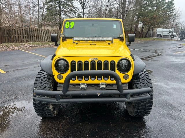 Used 2009 Jeep Wrangler Unlimited X with VIN 1J4GA39159L768300 for sale in Bloomfield Township, MI