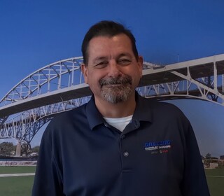 Staff member John Karnes from ID_e9919f7b8a03