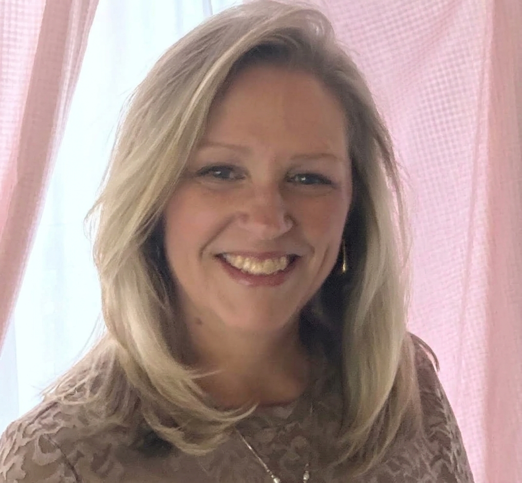 Staff member Jeanine Marsh from ID_7d77bf7ce9b9