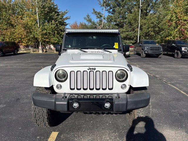 Used 2014 Jeep Wrangler Unlimited Sahara with VIN 1C4HJWEG4EL158873 for sale in Chelsea, MI
