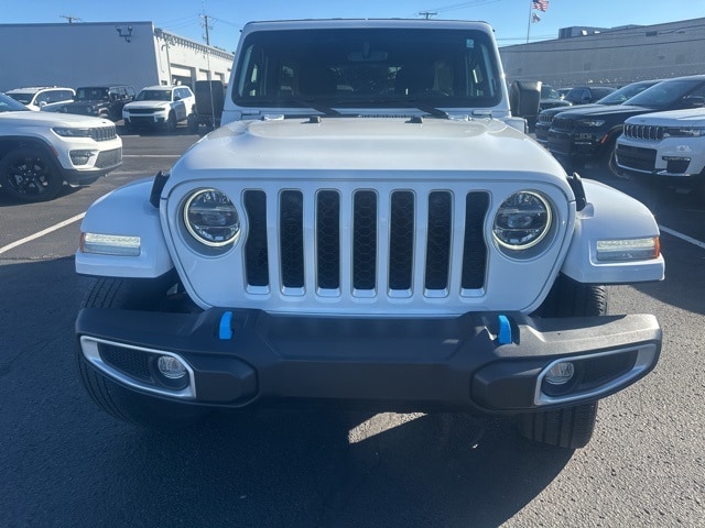 Used 2022 Jeep Wrangler Unlimited Sahara 4XE with VIN 1C4JJXP65NW177801 for sale in Roseville, MI