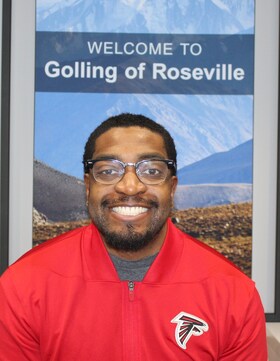 Staff member Malik Tann from b267778d46e0