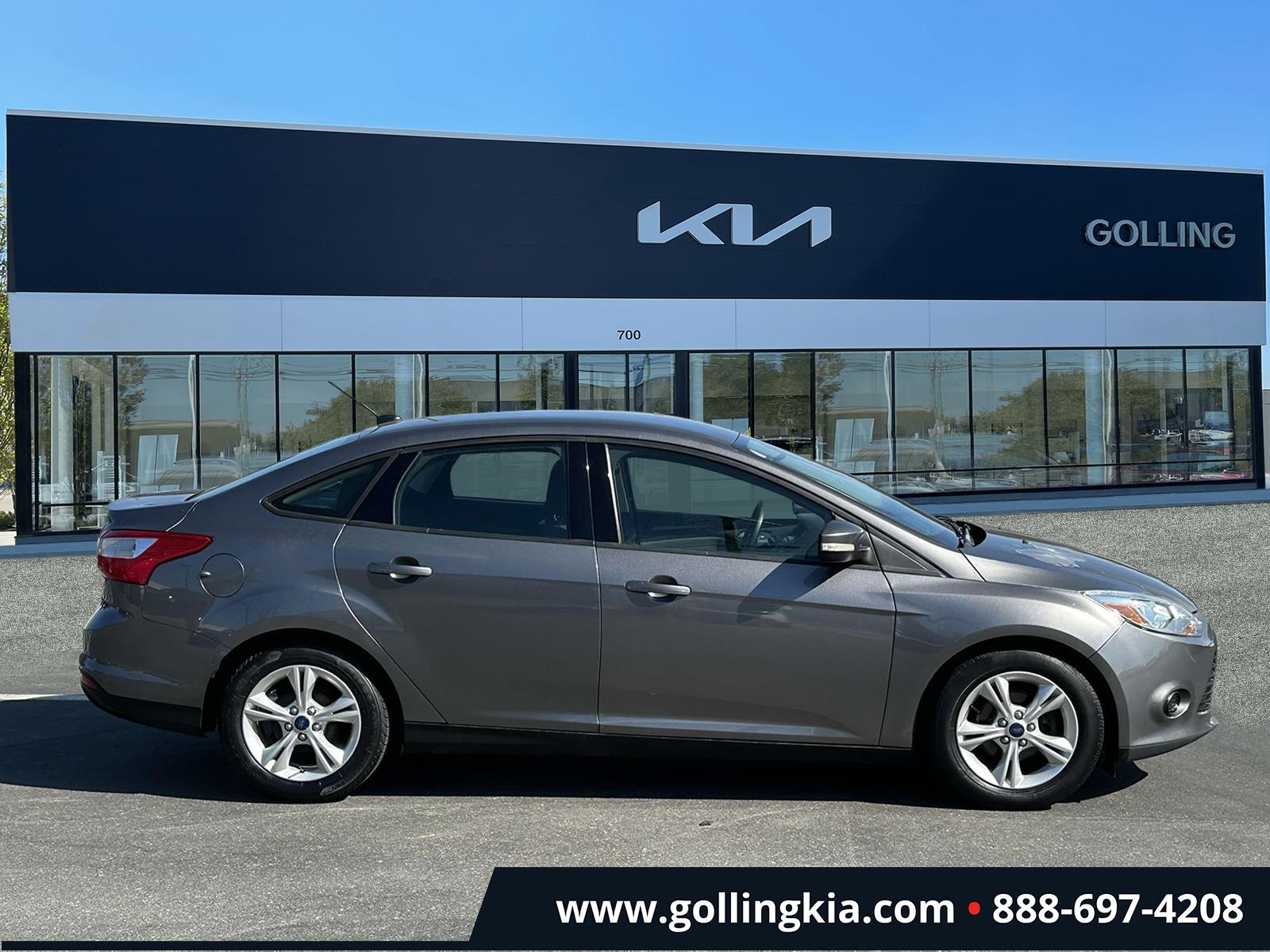 Used 2014 Ford Focus SE with VIN 1FADP3F2XEL459930 for sale in Madison Heights, MI