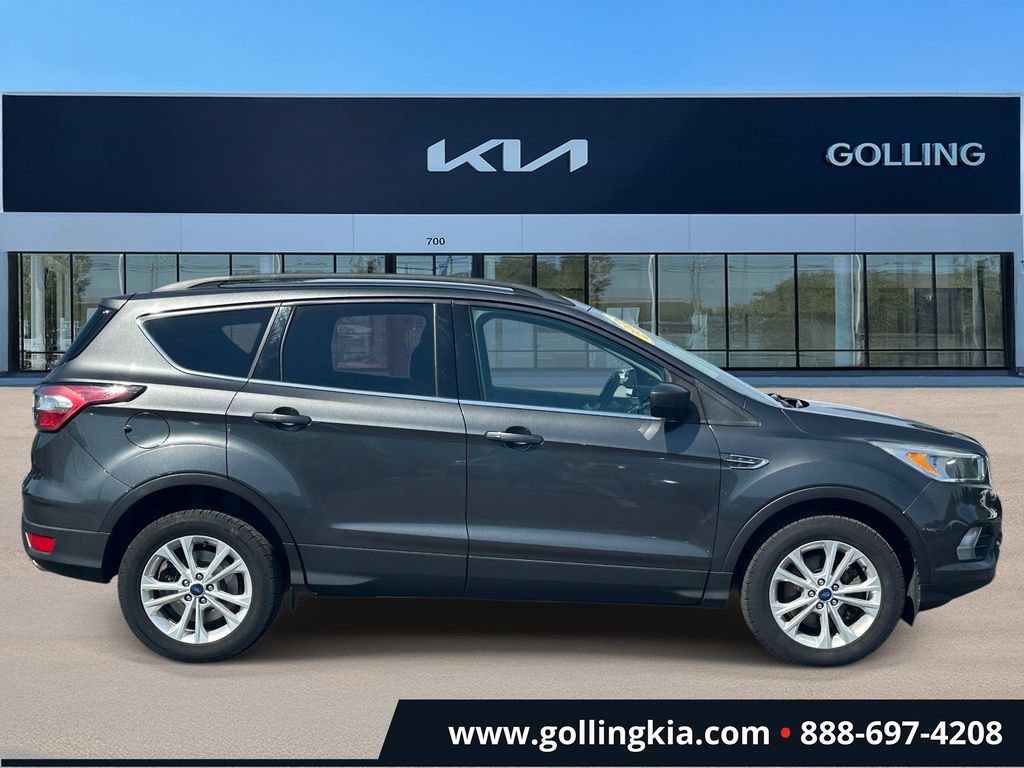 Used 2018 Ford Escape SE with VIN 1FMCU9GDXJUC57882 for sale in Madison Heights, MI