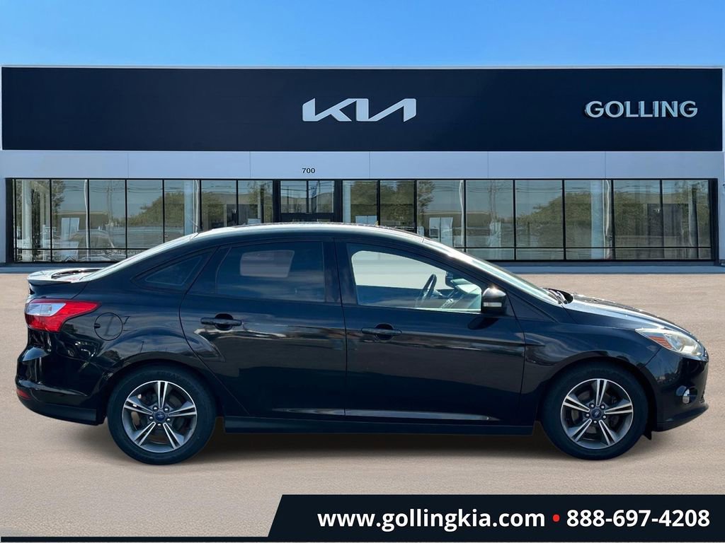 Used 2014 Ford Focus SE with VIN 1FADP3F28EL358238 for sale in Madison Heights, MI