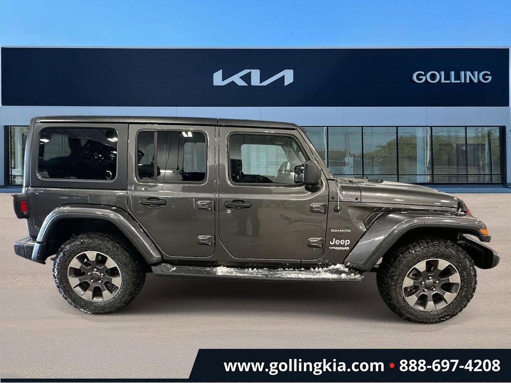 Used 2018 Jeep All-New Wrangler Unlimited Sahara with VIN 1C4HJXEG5JW173686 for sale in Madison Heights, MI