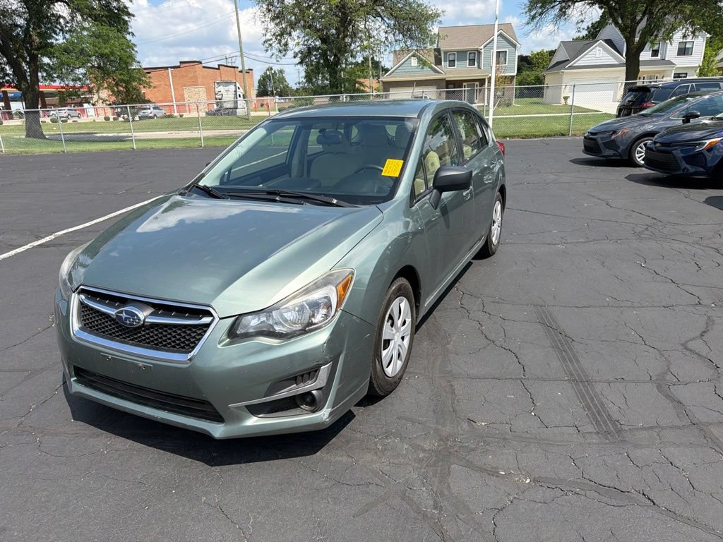 Used 2016 Subaru Impreza Base with VIN JF1GPAA69GG216990 for sale in Warren, MI