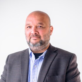 Staff member Neal Malabi from ID_65c3ed