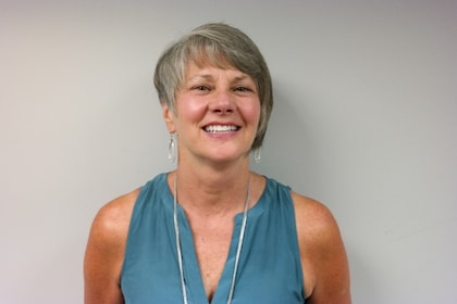 Staff member Jaenette Downing from 8ed56f14657c