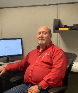 Staff member Ron Cressey from ID_984320df7772