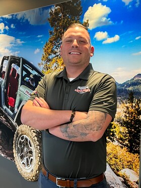 Staff member Tyler Cormier from 141daa69fe9c