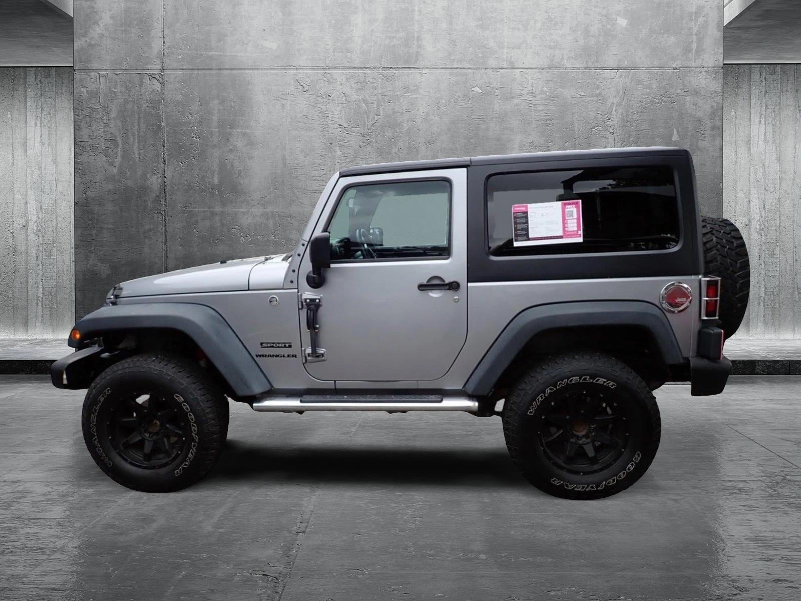 Used 2014 Jeep Wrangler Sport with VIN 1C4AJWAG7EL143971 for sale in Centennial, CO