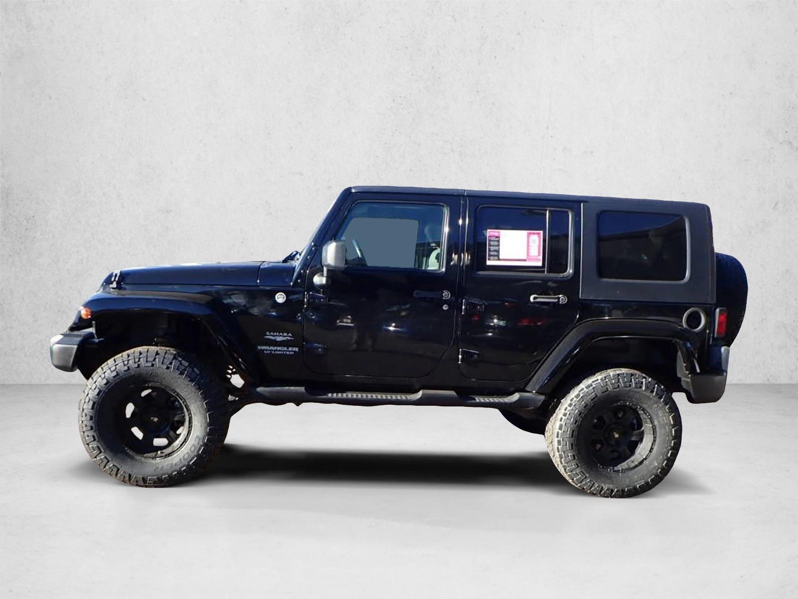 Used 2009 Jeep Wrangler Unlimited Sahara with VIN 1J4GA59179L762798 for sale in Centennial, CO