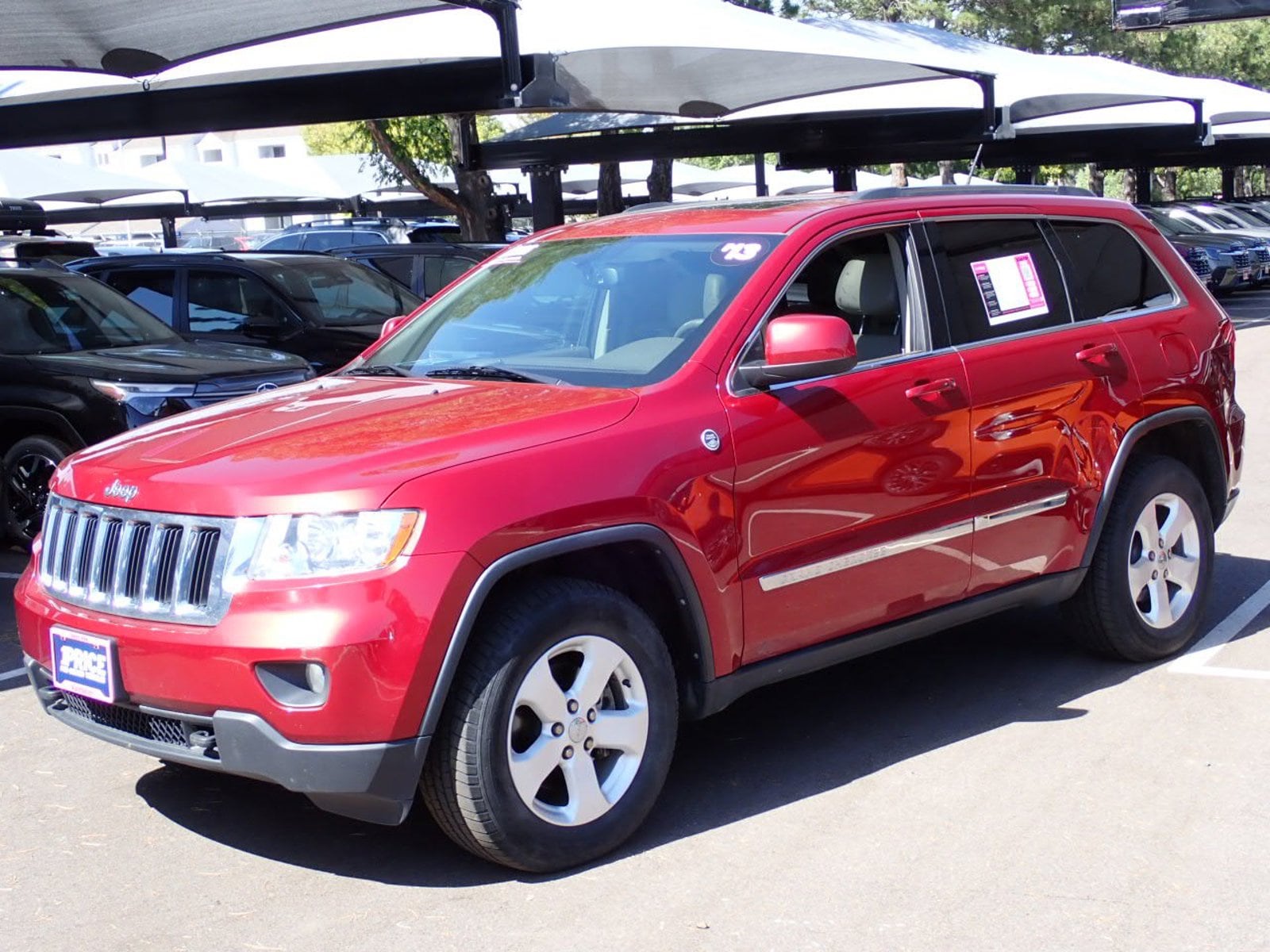 Used 2013 Jeep Grand Cherokee Laredo with VIN 1C4RJFAG5DC641992 for sale in Centennial, CO