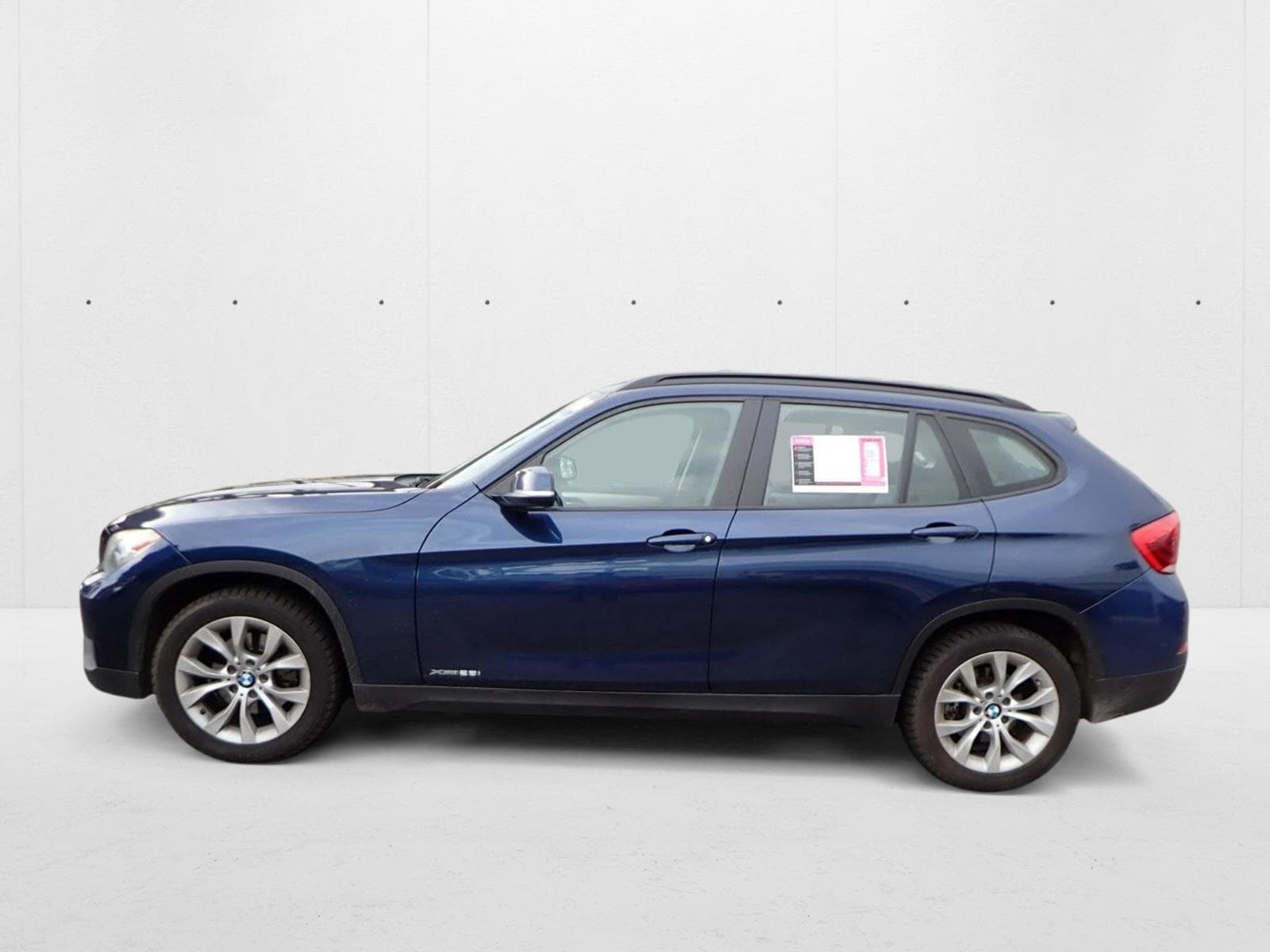 Used 2014 BMW X1 28i with VIN WBAVL1C56EVY11352 for sale in Centennial, CO