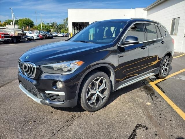 Used 2018 BMW X1 28i with VIN WBXHT3C30J5L31881 for sale in Mount Pleasant, MI