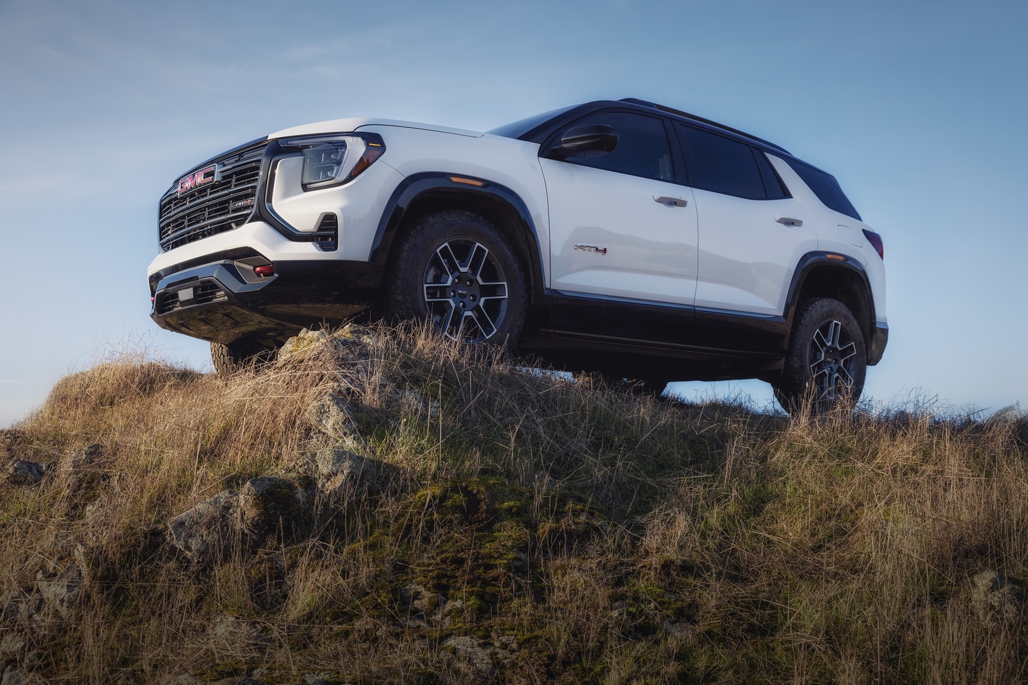2026 Terrain parked in grass on a hilltop.