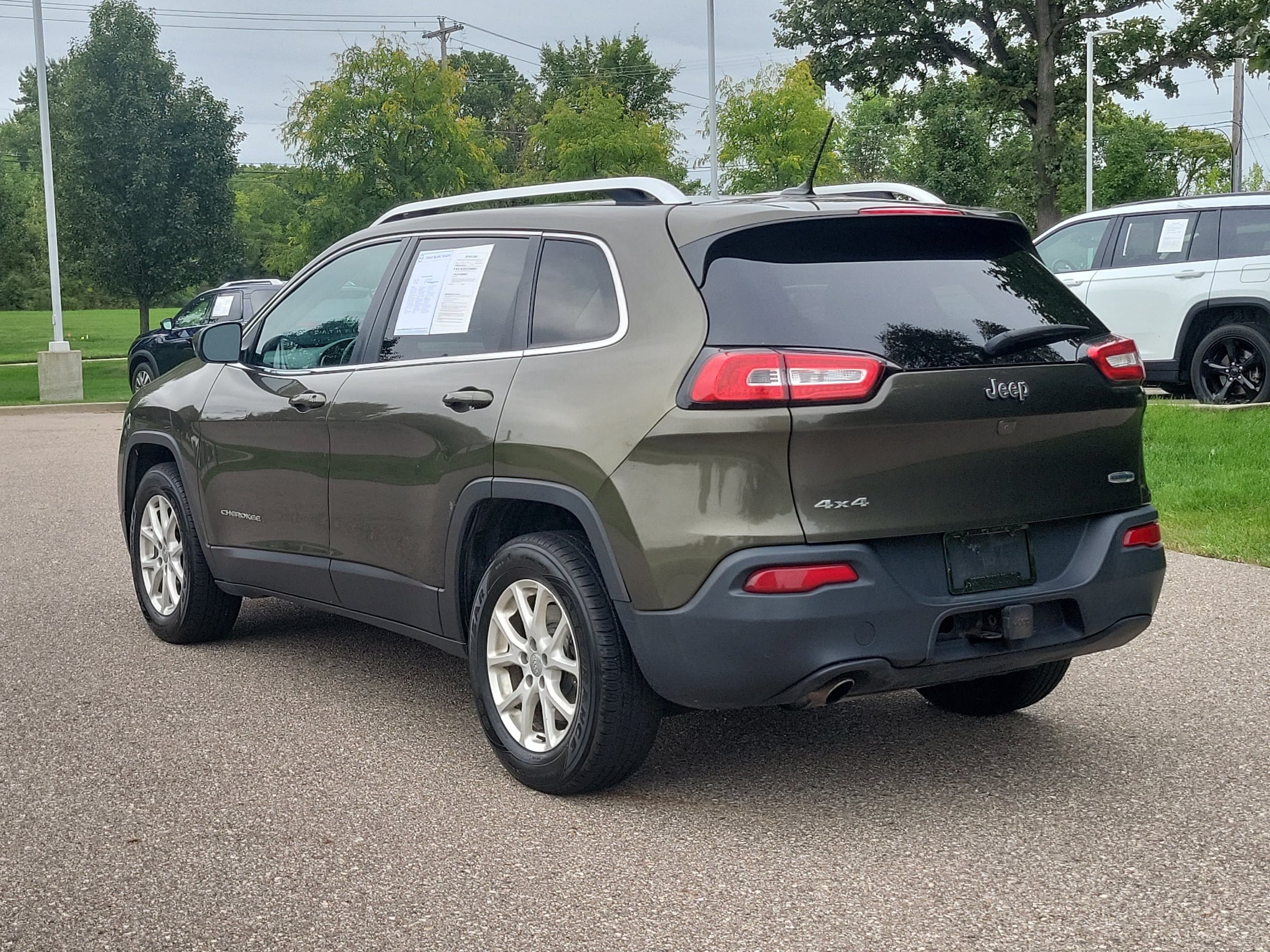 Used 2015 Jeep Cherokee Latitude with VIN 1C4PJMCB1FW749136 for sale in Grand Blanc, MI