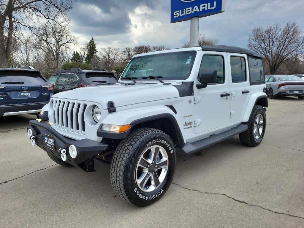 Used 2019 Jeep Wrangler Unlimited Sahara with VIN 1C4HJXEN5KW509949 for sale in Grand Forks, ND