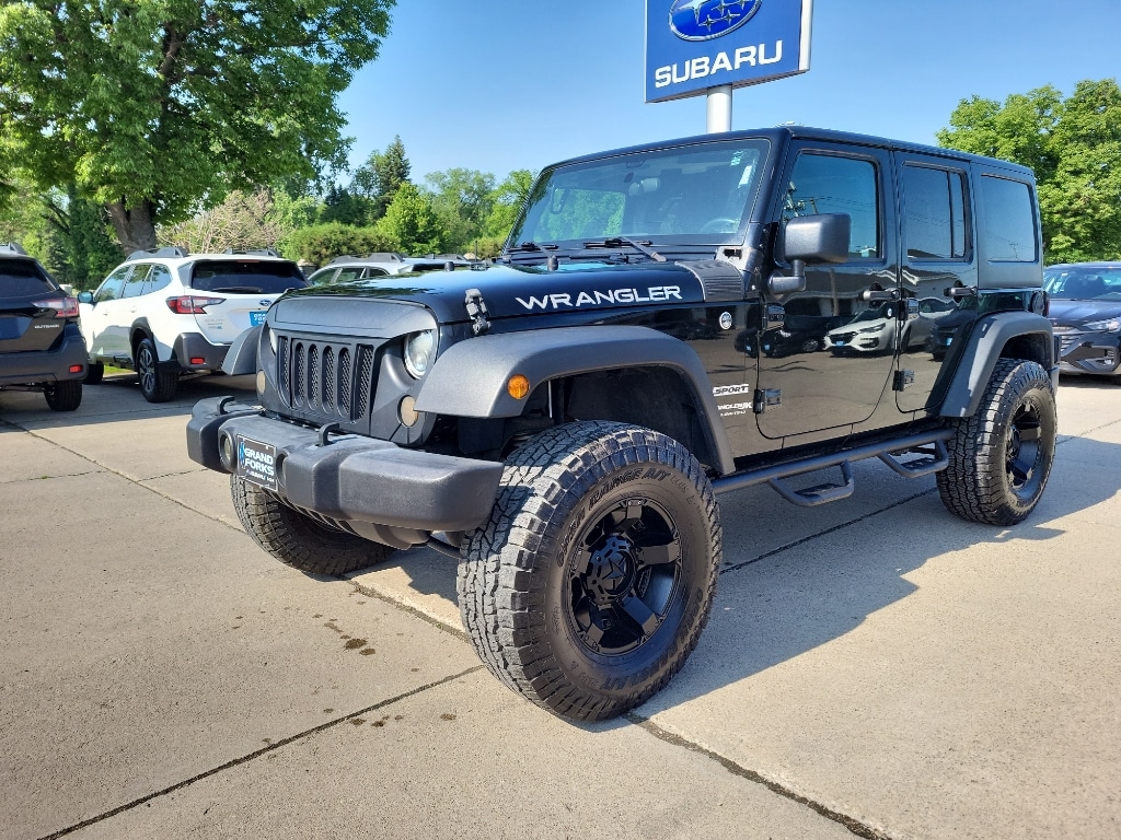 Used 2018 Jeep Wrangler JK Unlimited Sport with VIN 1C4BJWDG2JL908434 for sale in Grand Forks, ND