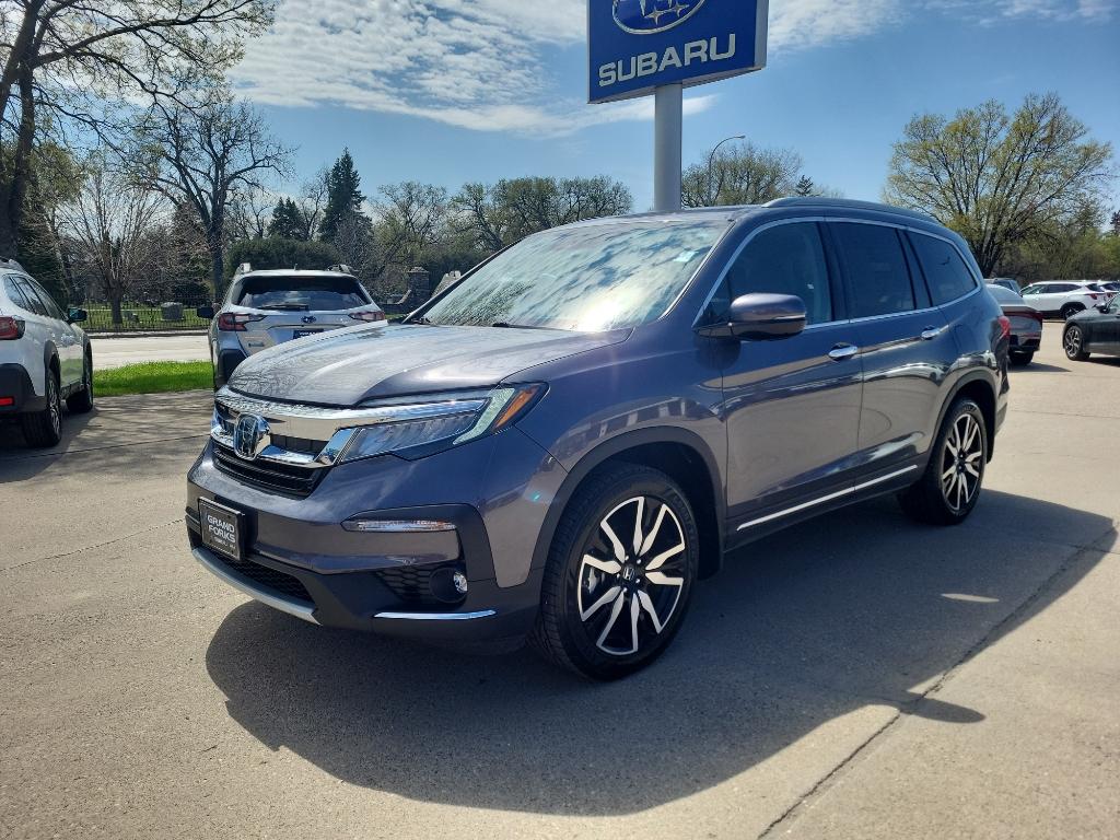 Used 2021 Honda Pilot Touring with VIN 5FNYF6H61MB000514 for sale in Grand Forks, ND