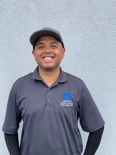 Staff member Frank Pena from 29580cdf678c