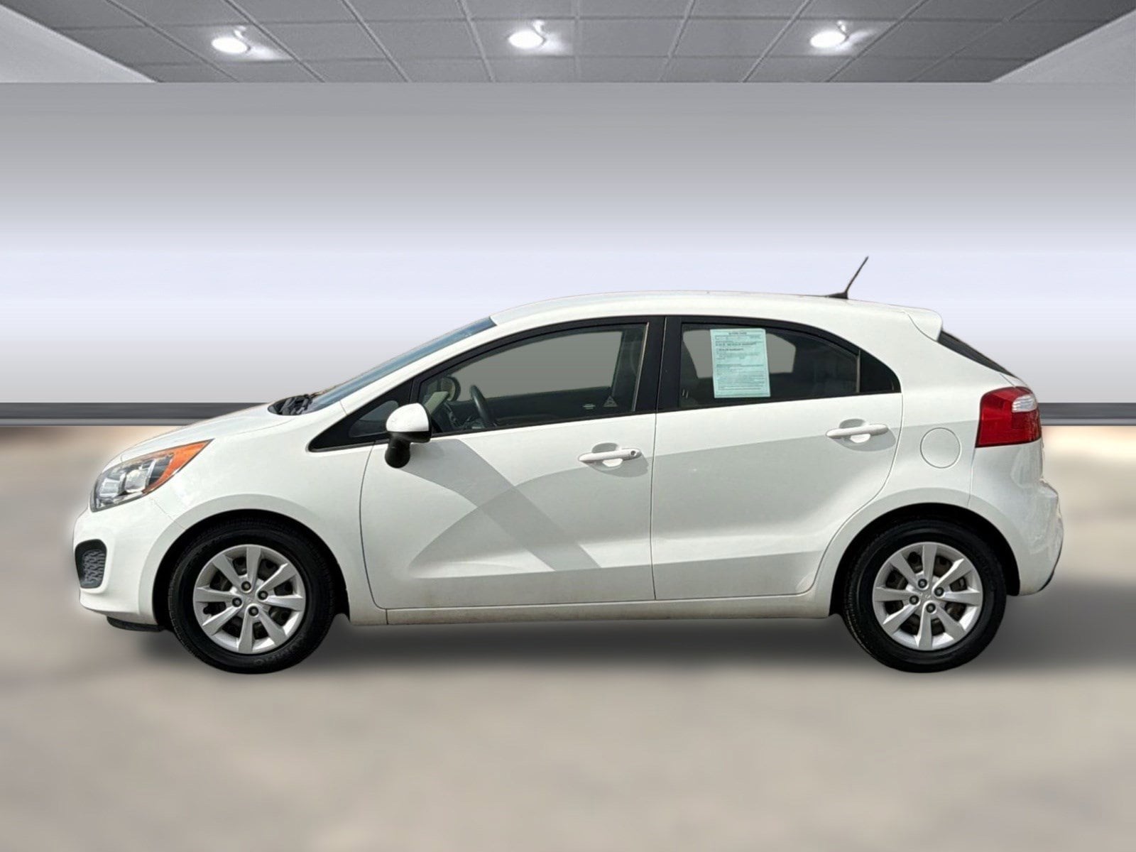 Used 2014 Kia Rio 5-Door LX with VIN KNADM5A38E6362560 for sale in Grand Junction, CO
