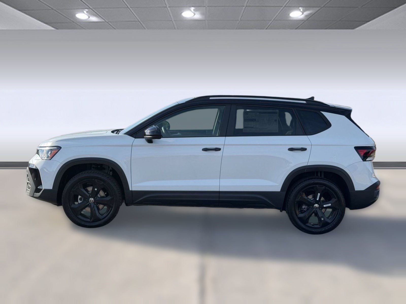New 2027 Volkswagen Taos 1.5T SE Black SUV