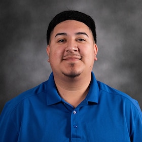 Staff member Isaac Oliva from ID_2fa313332f4e